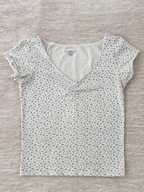 Brandy Melville Cream Top with Blue Floral Print